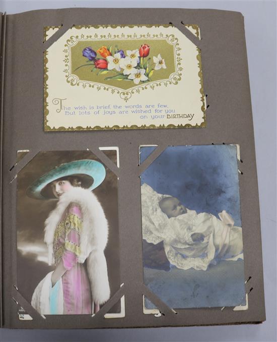A postcard album with theatrical cards etc